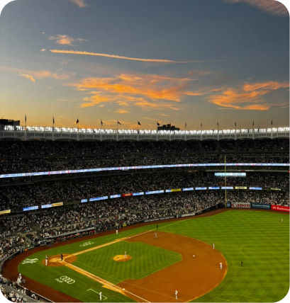 A baseball stadium at dusk.